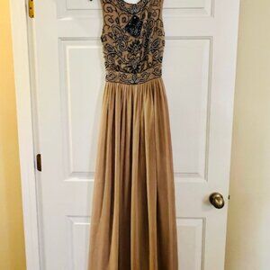Long Beige Gown with Beaded Bodice and Open Back